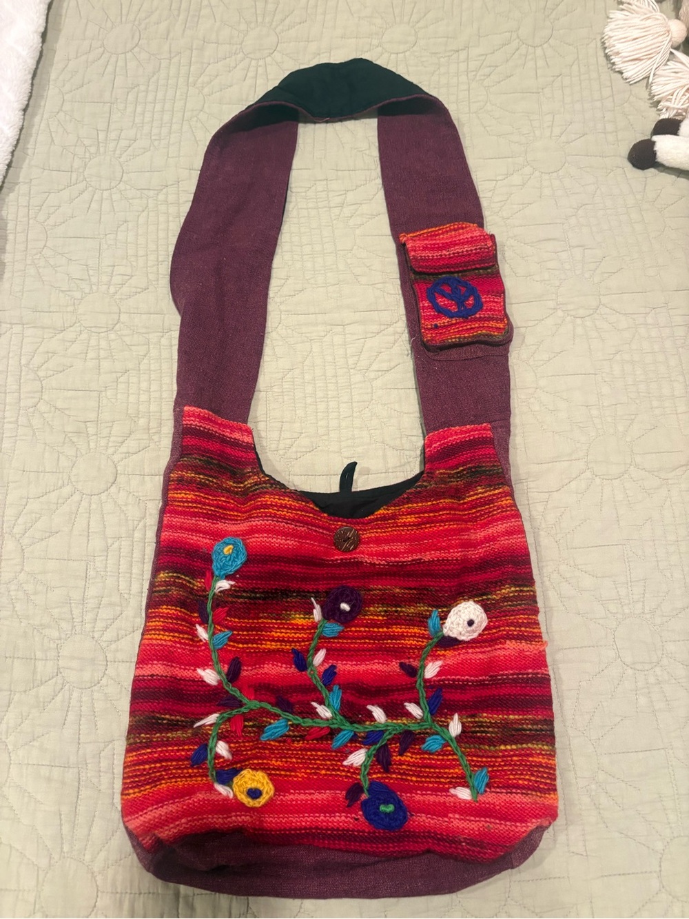 Handcrafted Colorful Hobo Bag with Embroidered Floral Detail Made in Nepal